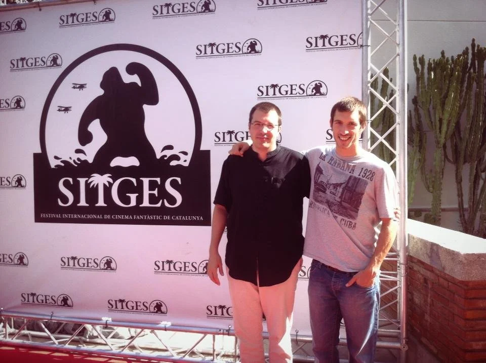 Gerard Pastor with his brother Albert at an outdoor photocall at the Sitges Festival.